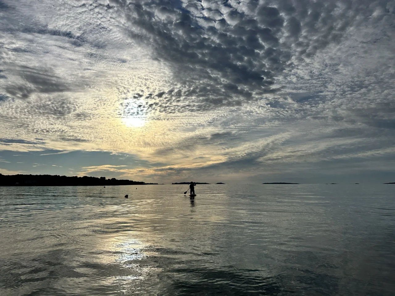 Paddle Boarding on flat ocean
